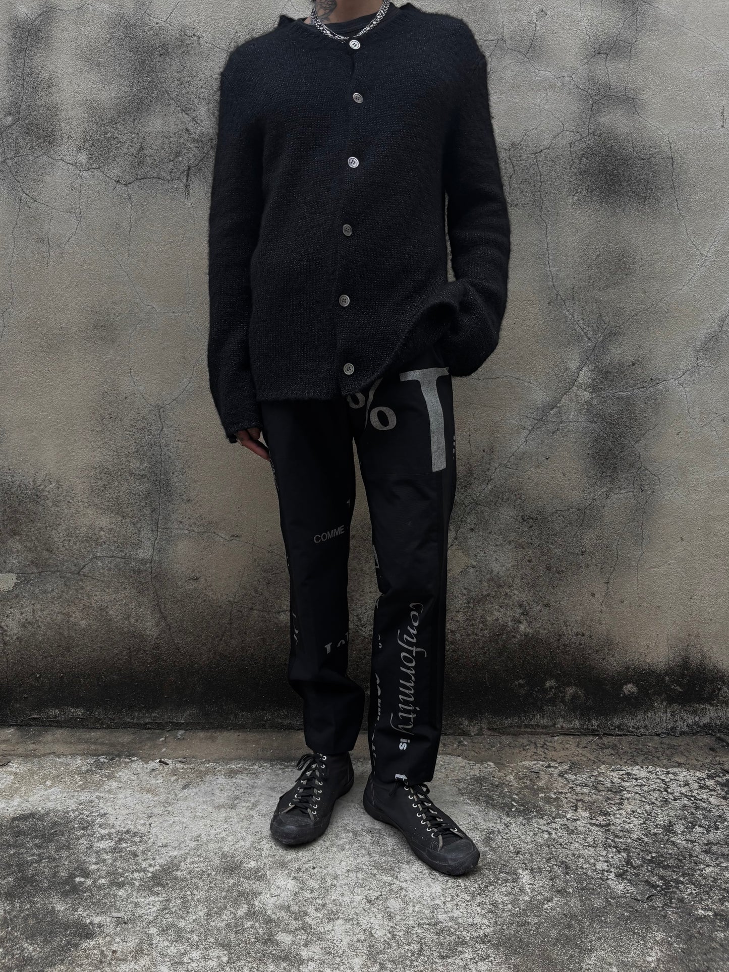 Come see Garçons Typo Wool Crop Pants