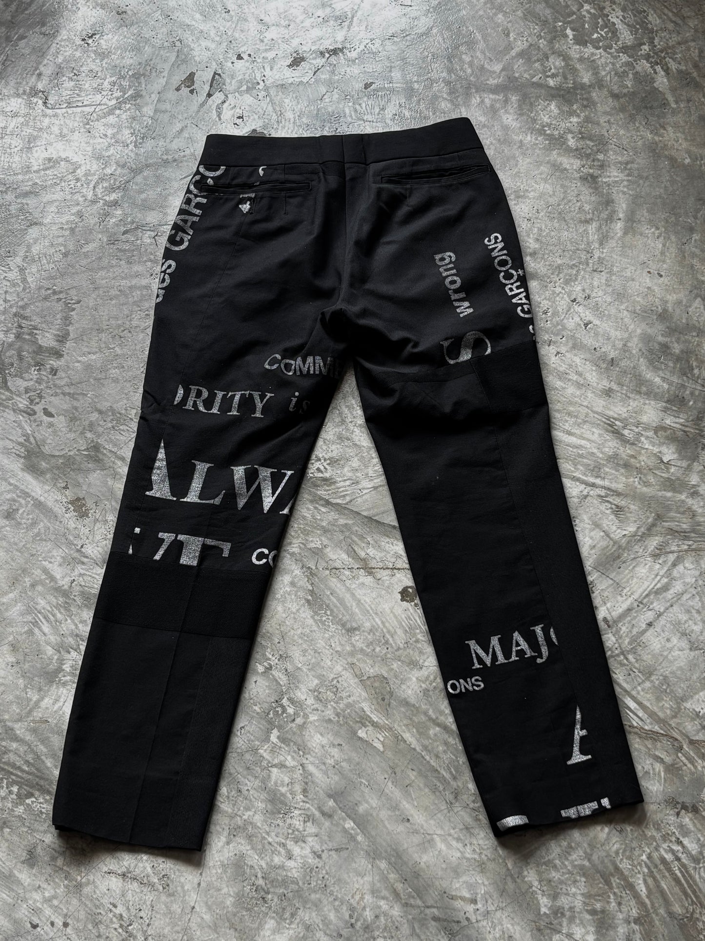 Come see Garçons Typo Wool Crop Pants