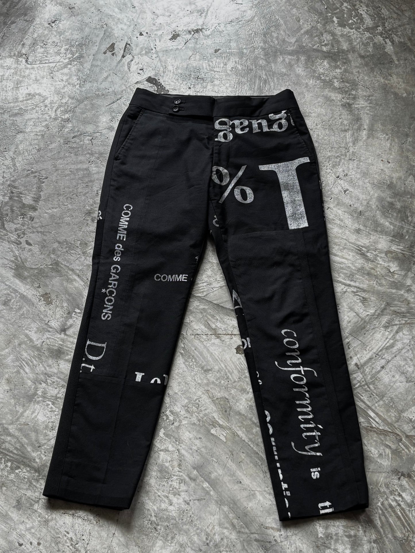 Come see Garçons Typo Wool Crop Pants